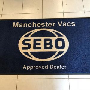 SEBO vacuum cleaner marketing carpet floor mat with printed logo for shampoo demonstration